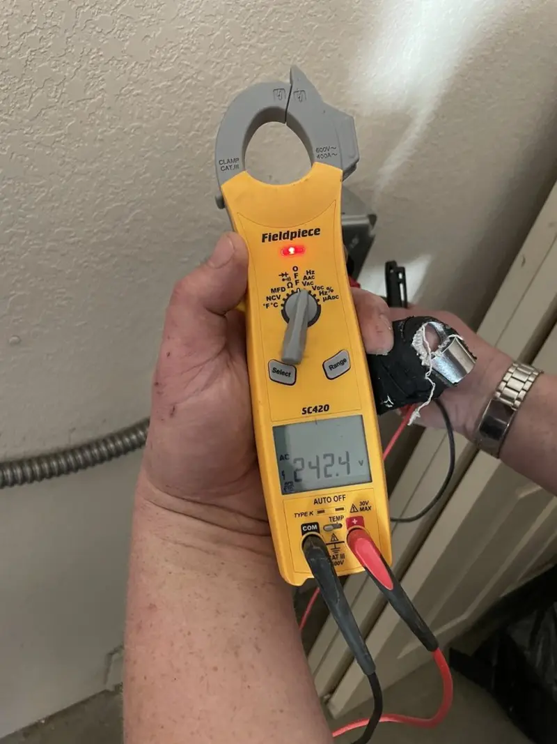 Voltage testing with clamp meter during Generator Installation in Riverdale